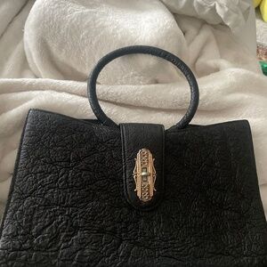 Genuine antique elephant hide purse